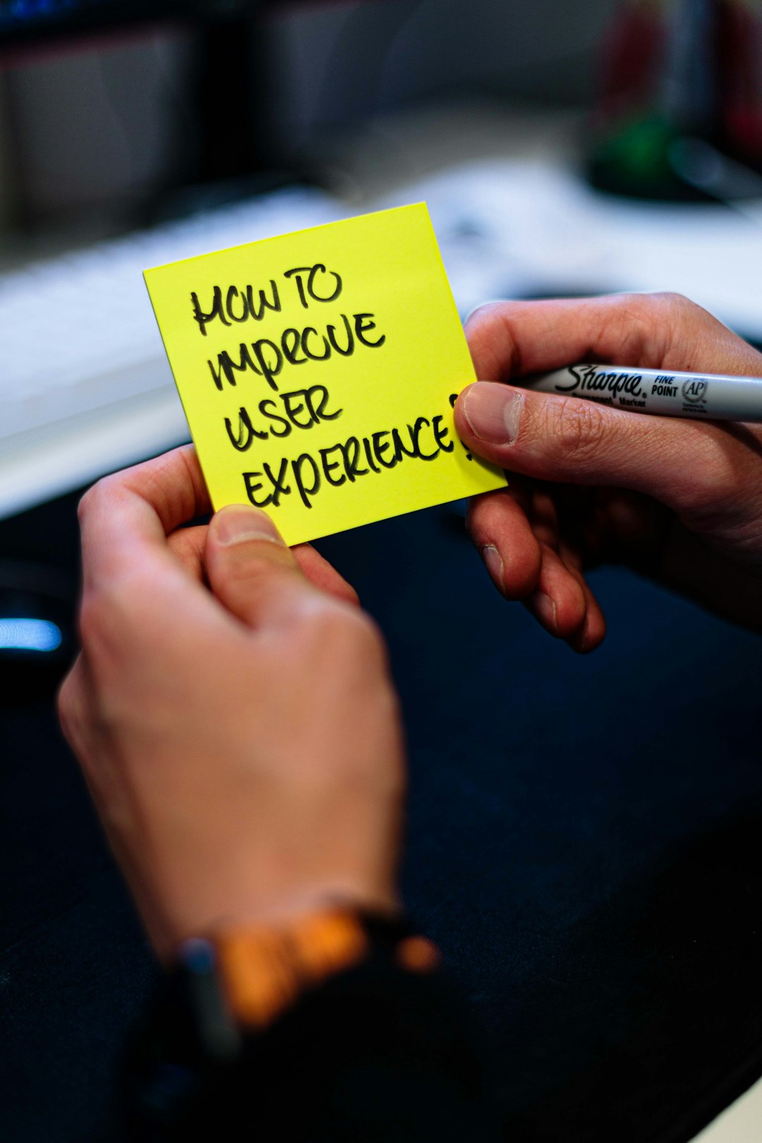 a-person-holding-a-yellow-book-uts3g7xlrv0